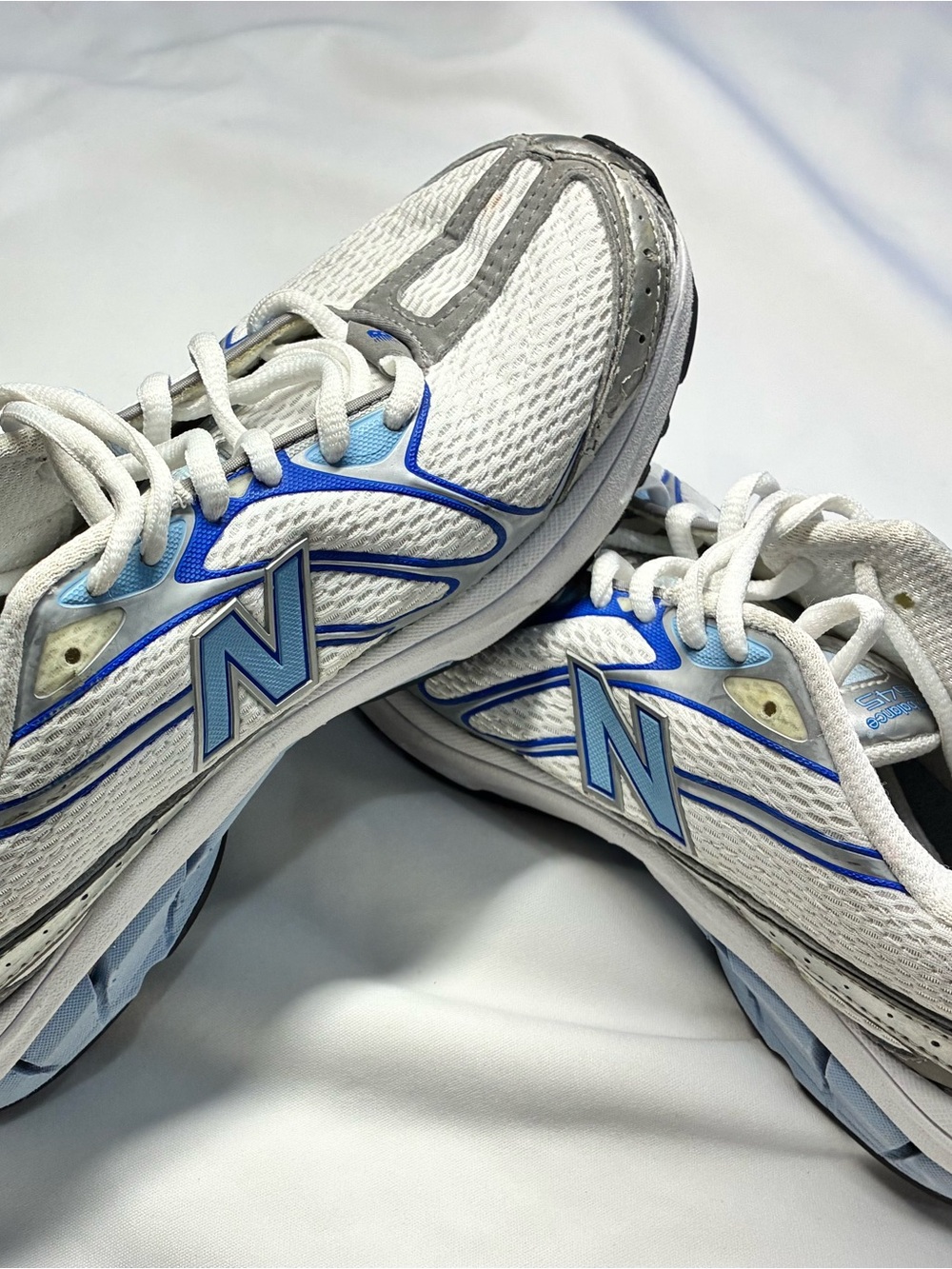 New Balance White and Light Blue Athletic Sneakers
